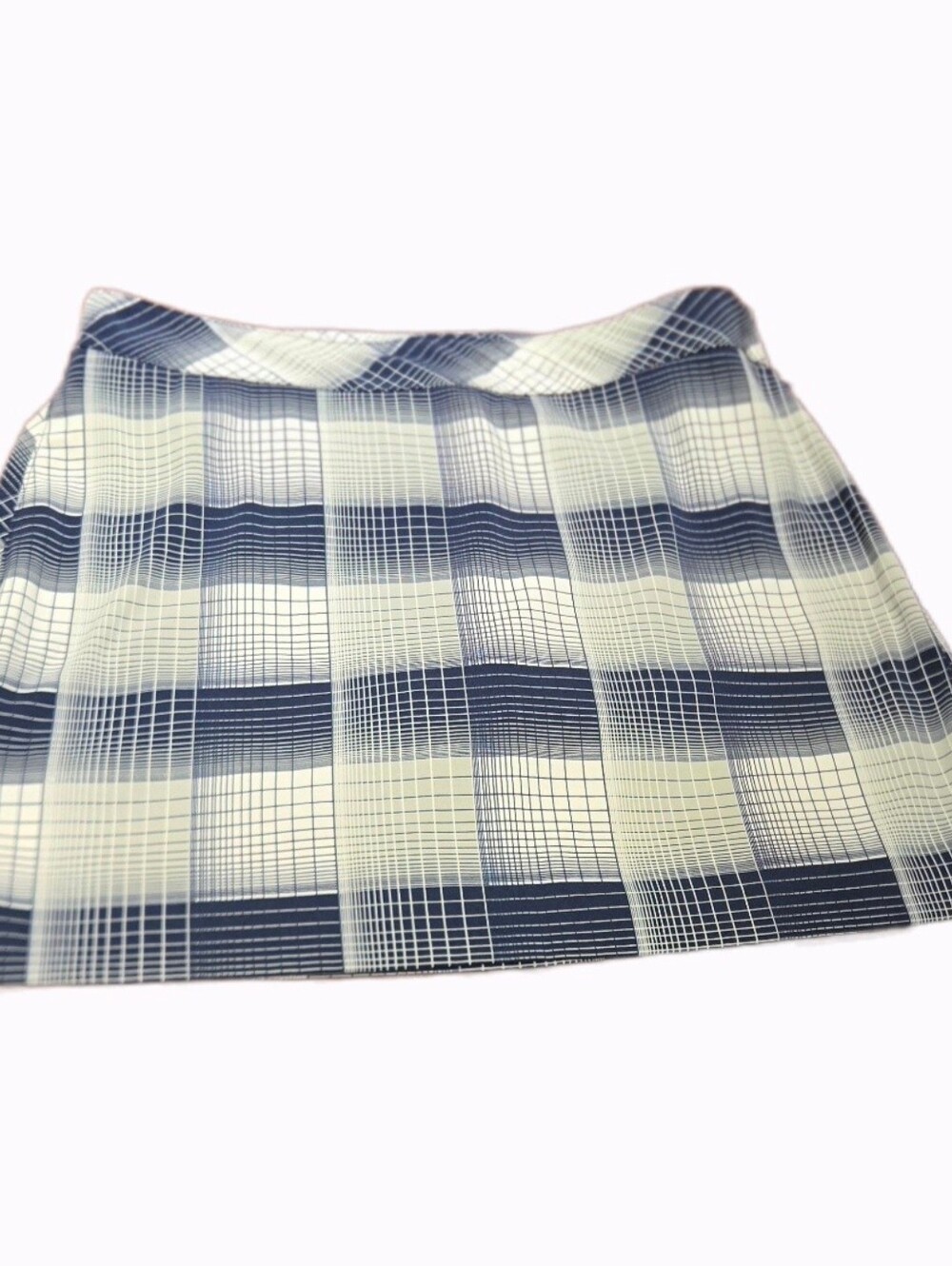 Izod blue and white skort with attached shorties. Size 12. 18" length. EUC!